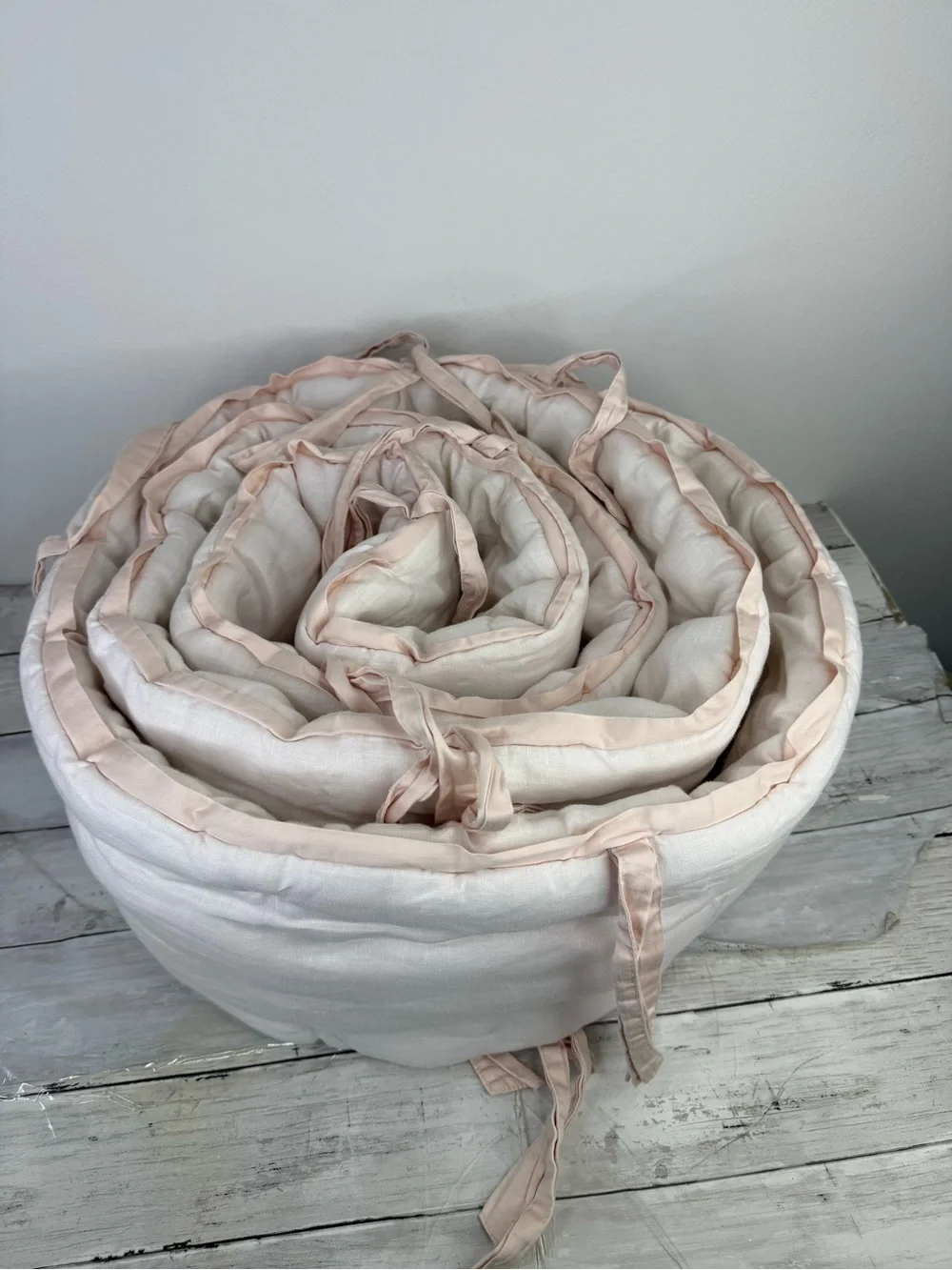 Pottery Barn kids bedding in blush pink.